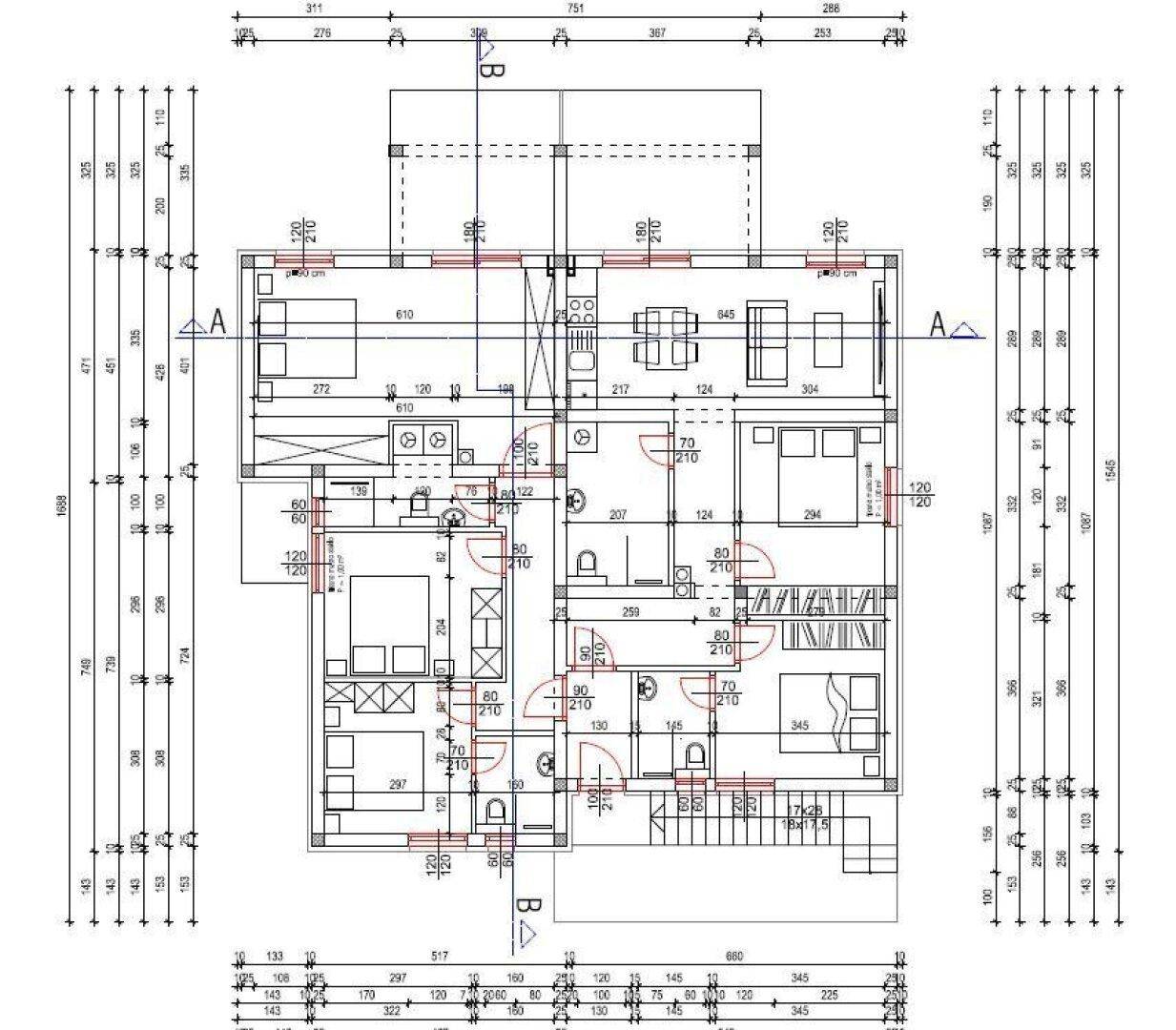 Detaillierter Grundriss eines Wohngebäudes mit verschiedenen Zimmern, offenem Layout und Balkonen.