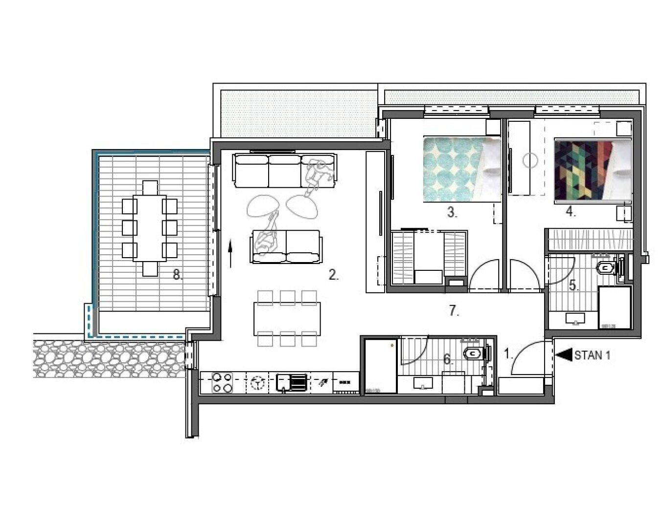 Grundriss einer Wohnung mit offener Küche, Wohnbereich und großer Terrasse.