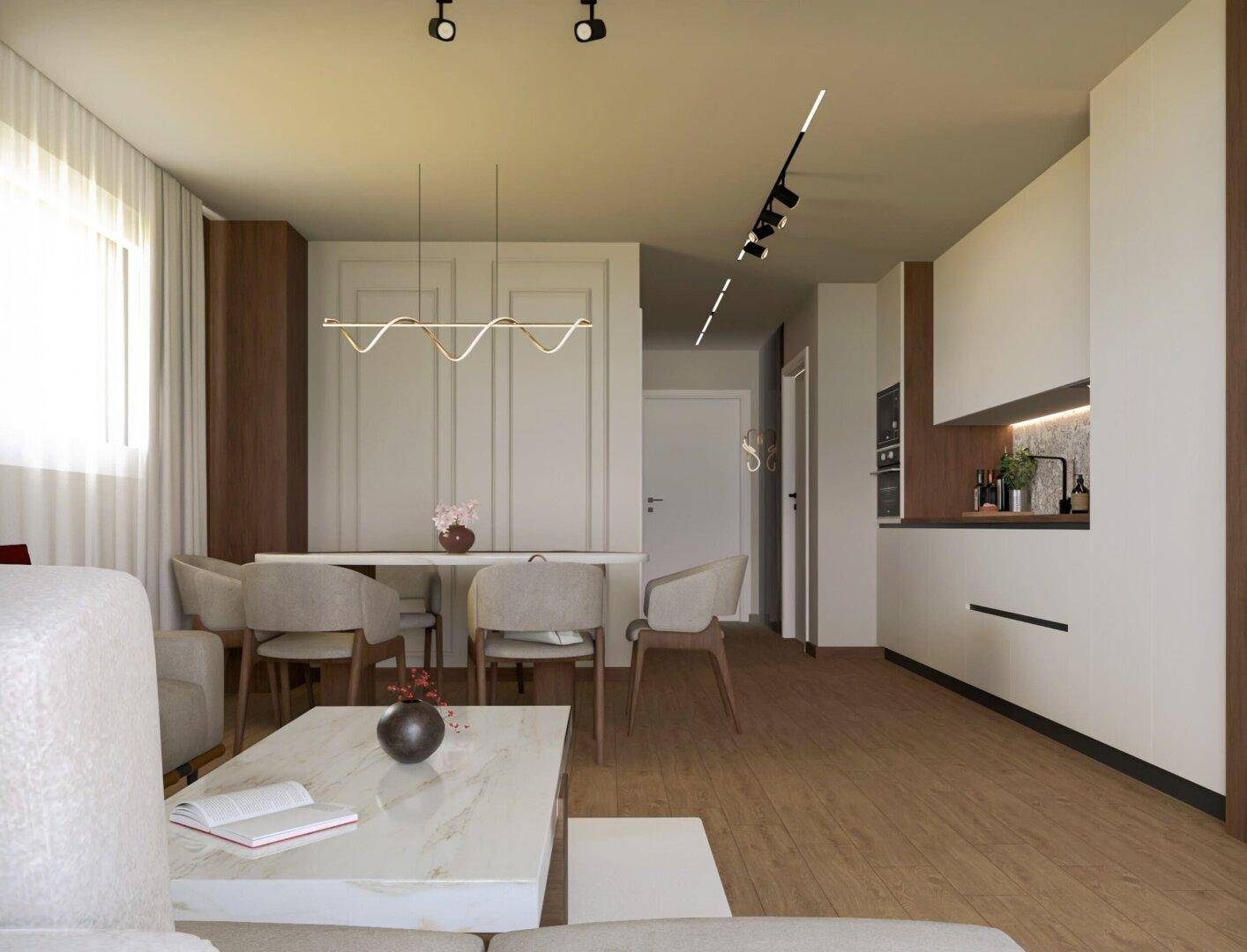 Offener Wohn-Essbereich mit integrierter Küche, modernem Design und Holzboden.