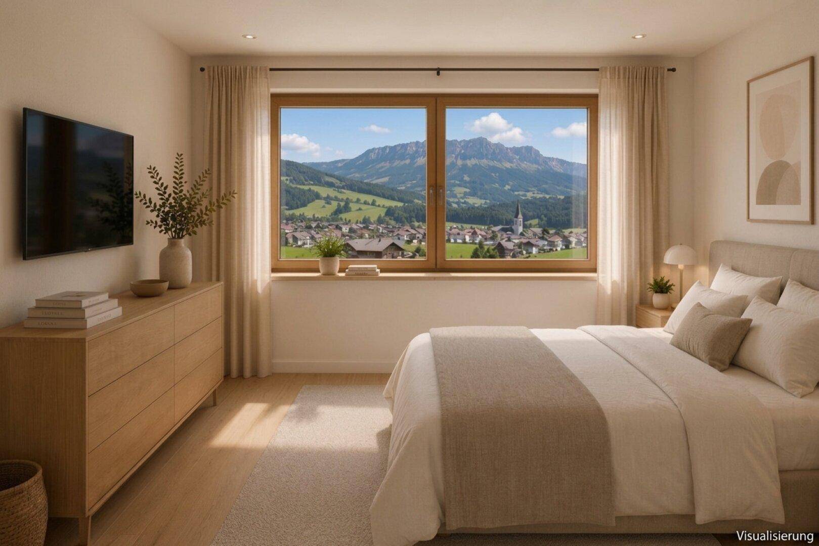 Gemütliches Schlafzimmer mit großem Fenster, das einen malerischen Blick auf das Dorf und die Berge bietet.