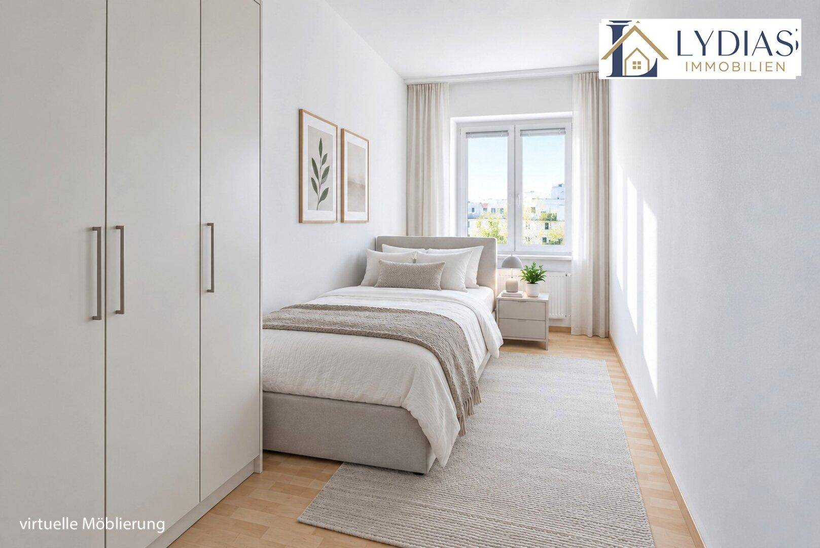 Helles Schlafzimmer mit Einzelbett, Kleiderschrank und Blick ins Grüne durch das Fenster.