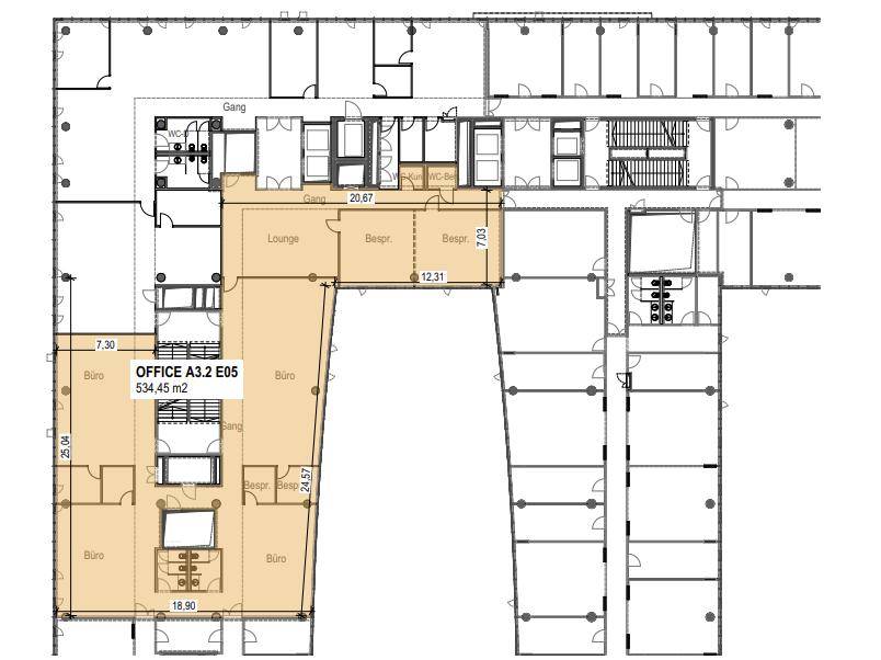 Grundriss eines Bürogeschosses mit mehreren Büroräumen, Besprechungsbereichen und Toiletten, wobei eine Einheit hervorgehoben ist.