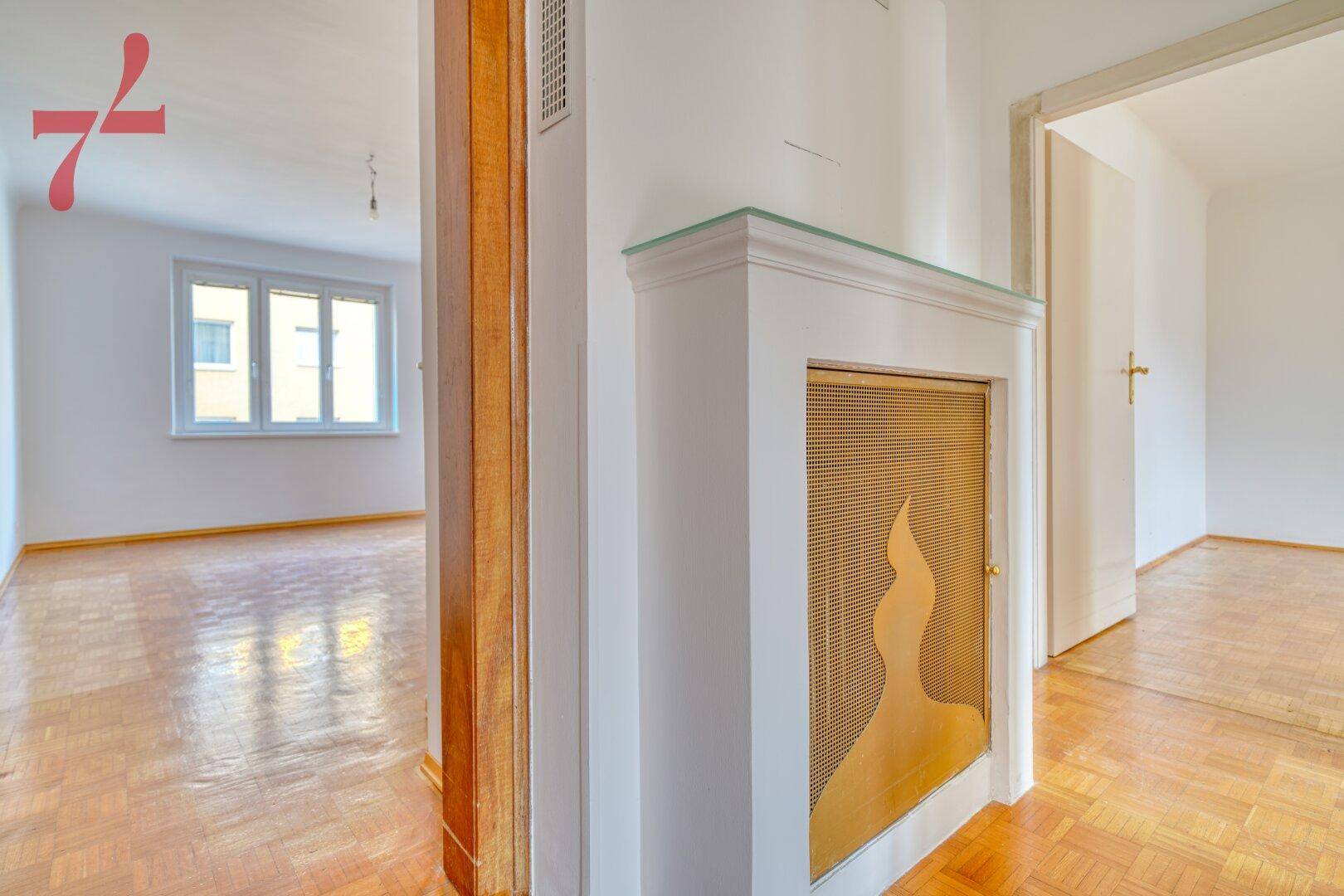 Wohnraum mit Blick in Zimmer 1