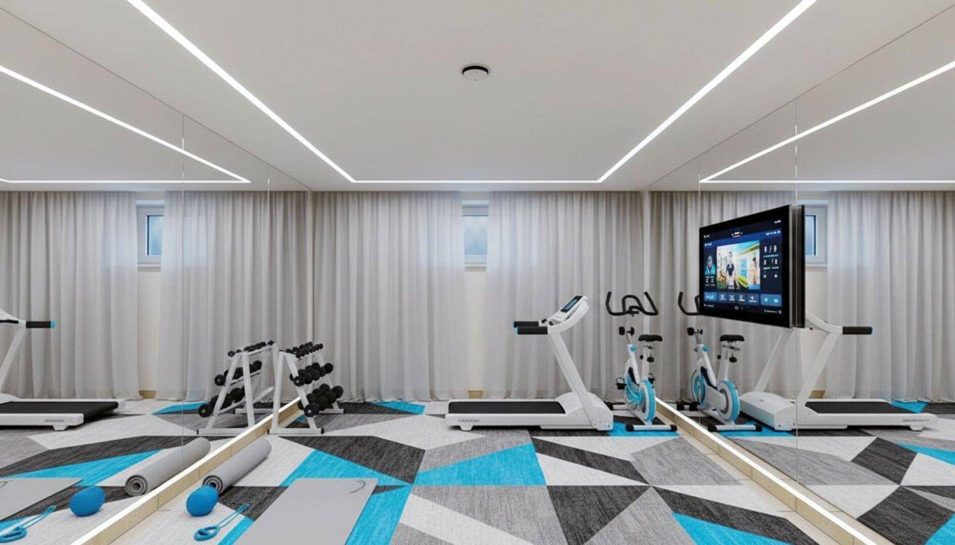 Moderner Fitnessraum mit Laufbändern, Fahrrädern und Hanteln, ausgestattet mit Spiegelflächen und geometrischem Teppichboden.
