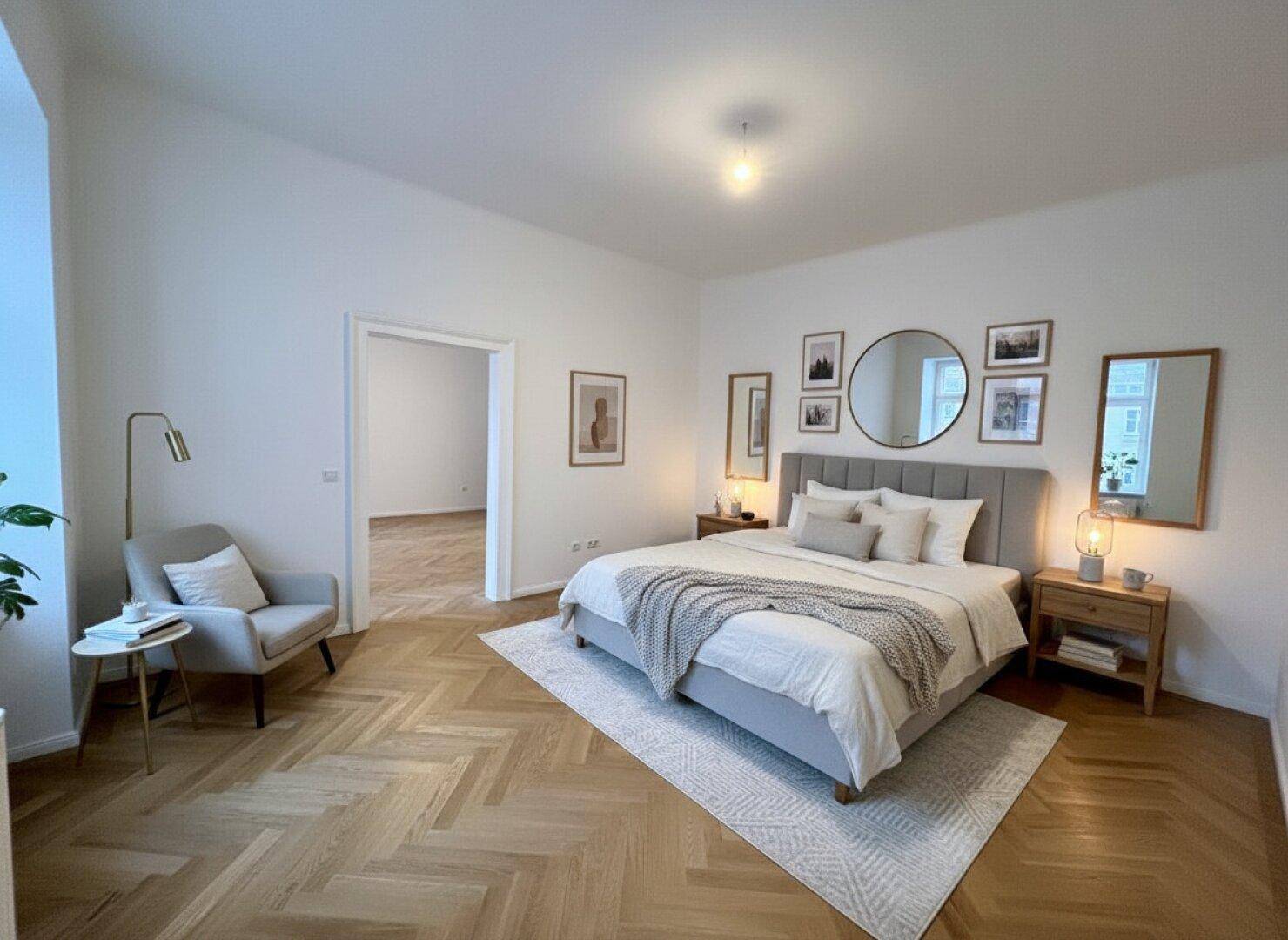 Gemütliches Schlafzimmer mit großem Bett, Fischgrätparkett und moderner Dekoration.