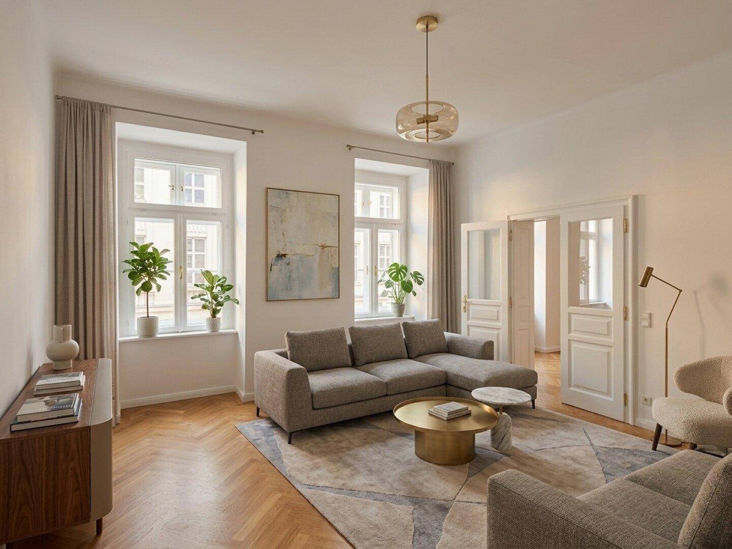Modern eingerichtetes Wohnzimmer mit Fischgrätparkett, bequemer Couch und stilvoller Dekoration.