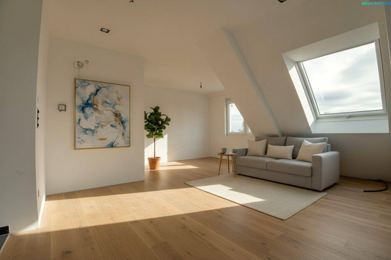 Helles Wohnzimmer im Dachgeschoss mit Holzboden, Dachfenstern und moderner Einrichtung.