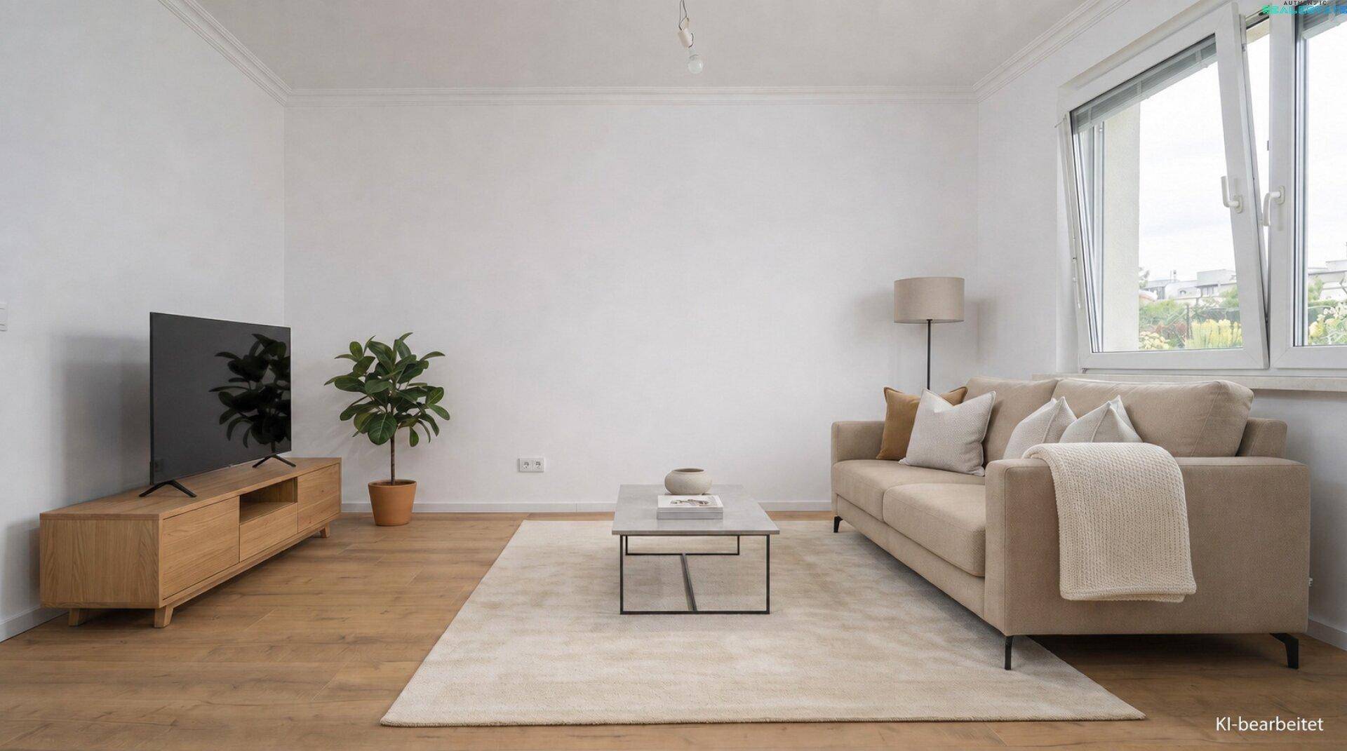 Gemütliches Wohnzimmer mit beigem Sofa, modernem TV-Möbel und hellem Holzboden.