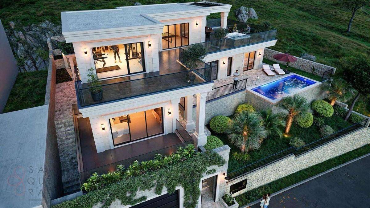 Vogelperspektive der modernen Villa mit mehreren Terrassen, Pool und gepflegtem Garten.