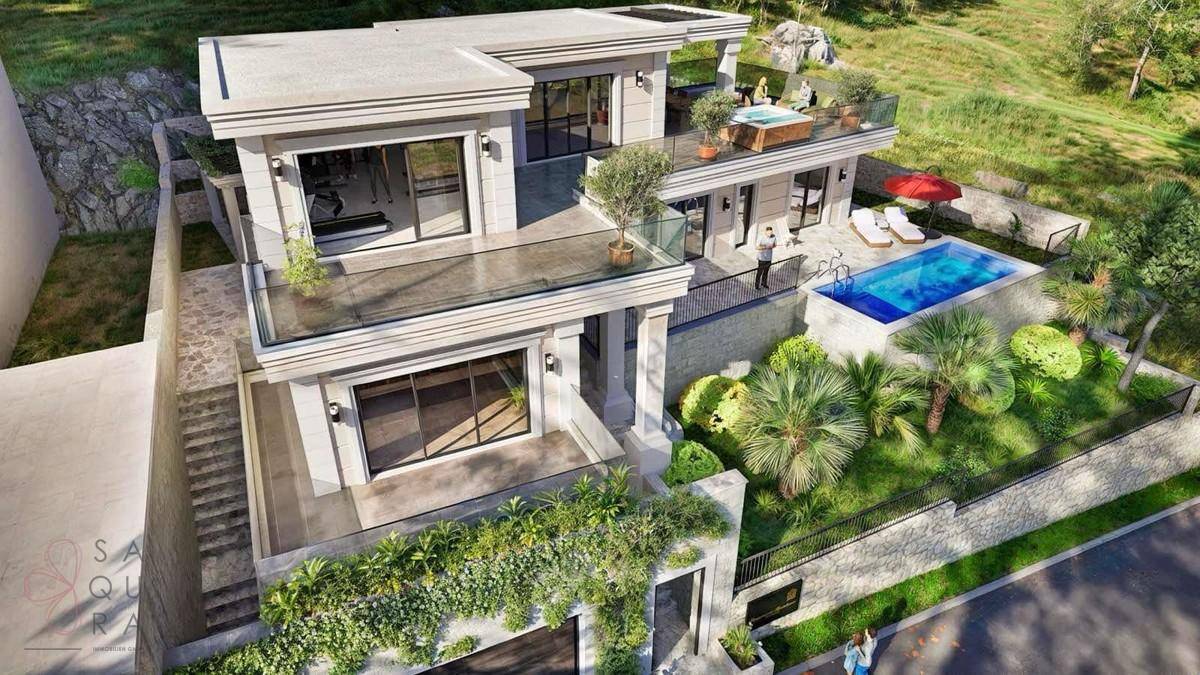 Vogelperspektive der modernen Villa mit mehreren Terrassen, Pool und gepflegtem Garten.