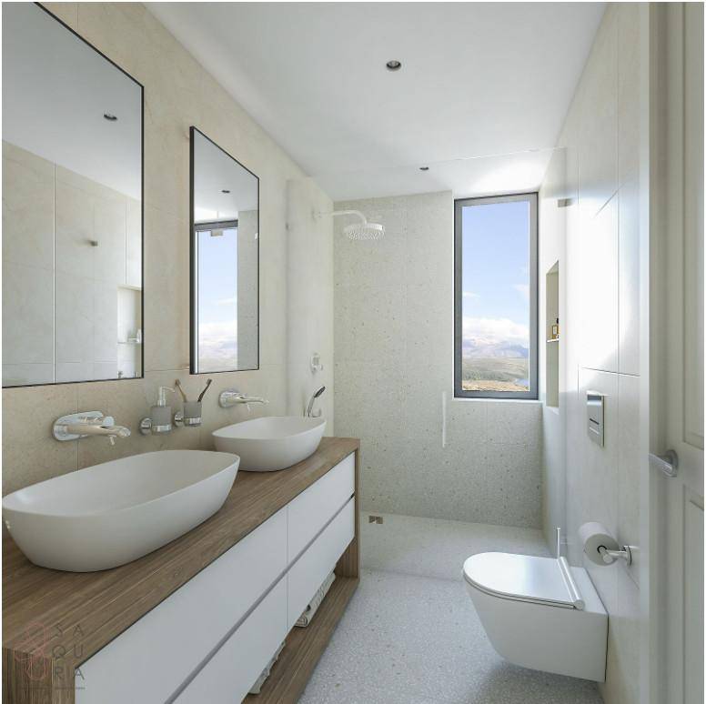 Ein modernes Badezimmer mit Doppelwaschbecken, begehbarer Dusche und Fenster für Tageslicht.