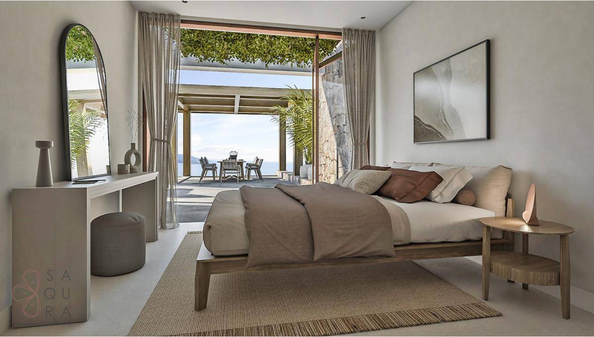 Helles Schlafzimmer mit Zugang zur Terrasse, Meerblick und moderner Einrichtung.