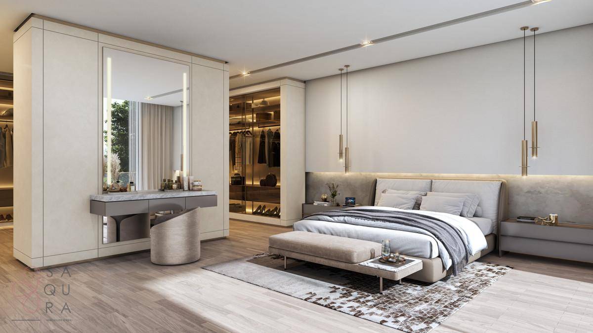 Elegantes Schlafzimmer mit großem Bett, integriertem Schminktisch und offenem Zugang zum Ankleidebereich.