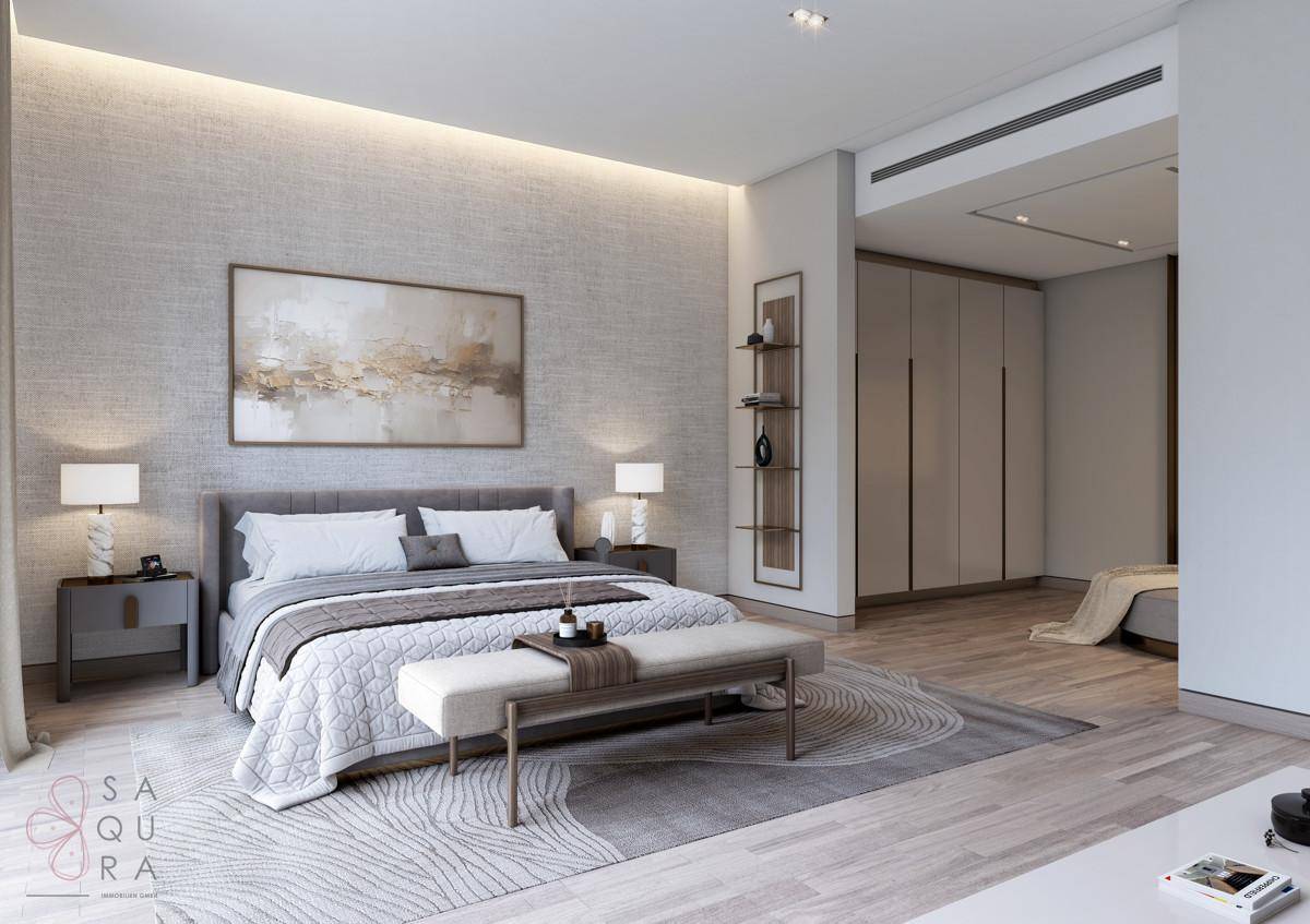 Modernes Schlafzimmer mit komfortablem Bett, stilvoller Wandgestaltung und integriertem Ankleidebereich.