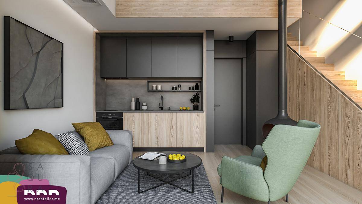 Offener Wohnbereich mit Küchenzeile, Holztreppe und modernem Design.