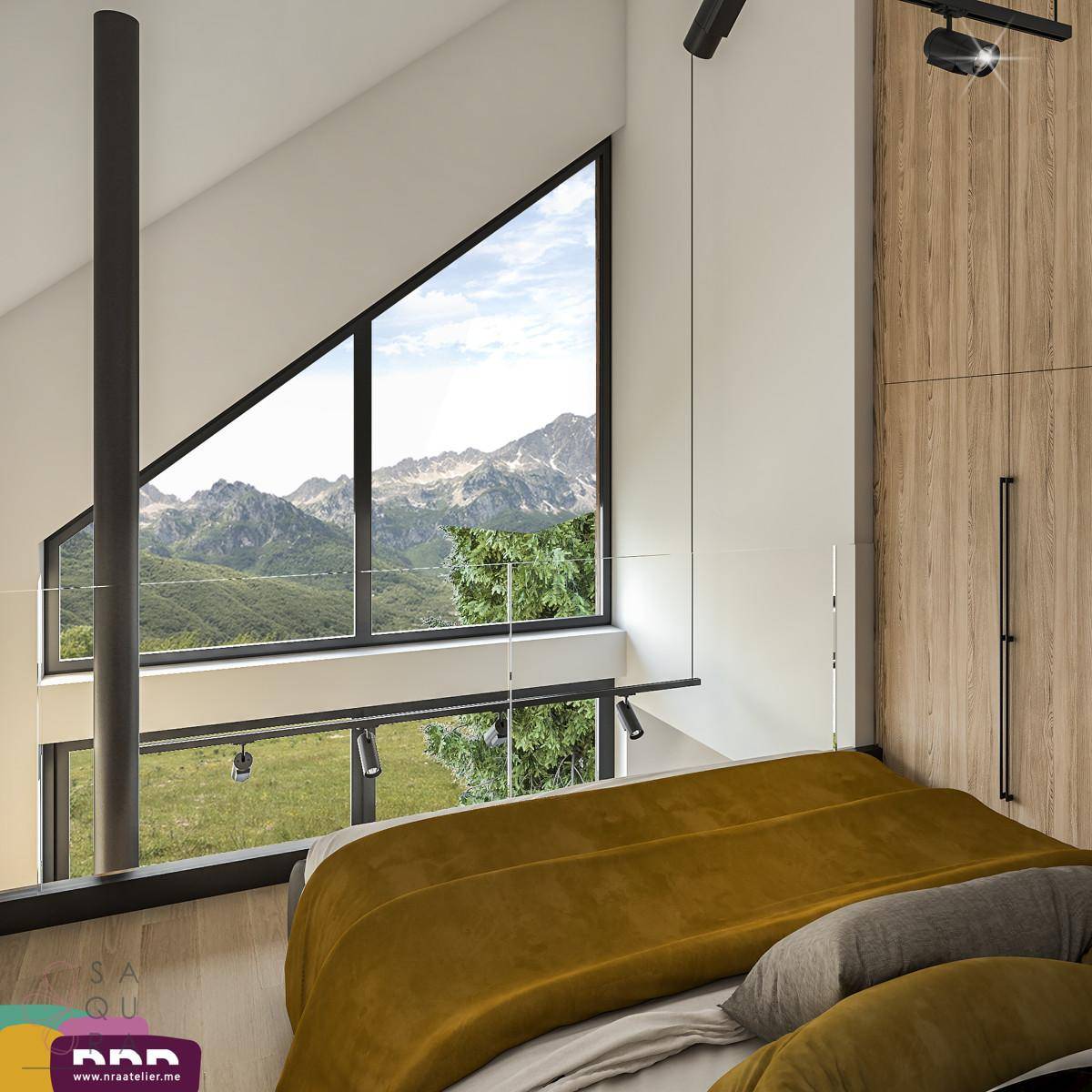 Schlafzimmer mit beeindruckendem Bergblick durch große, schräge Fenster.