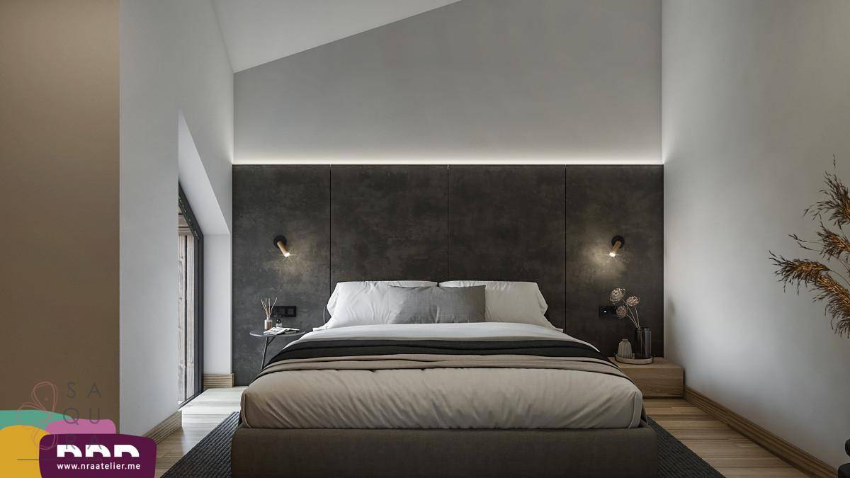 Schlafzimmer im Dachgeschoss mit schräger Decke, indirekter Beleuchtung und modernem Design.