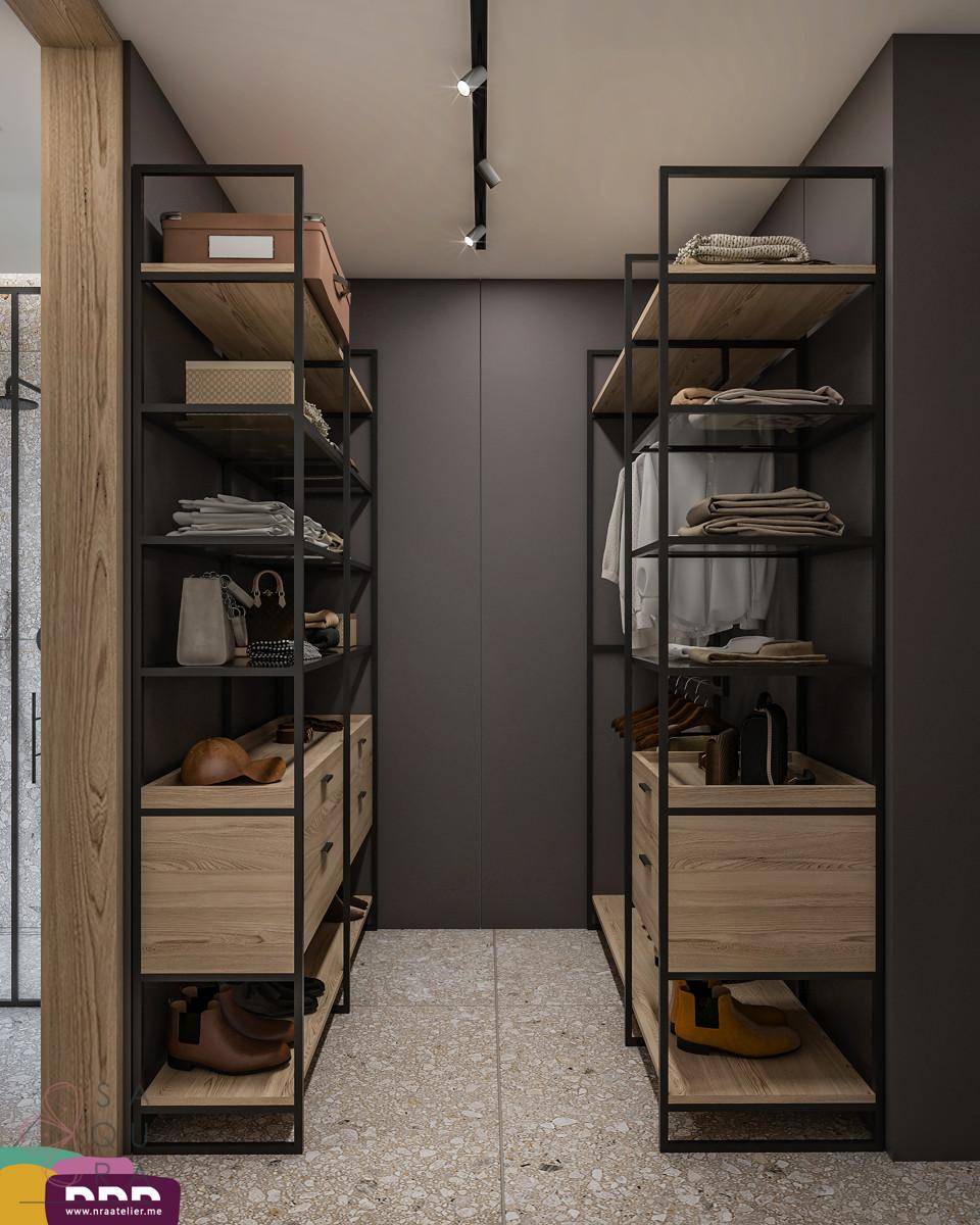 Geräumiger begehbarer Kleiderschrank mit offenen Regalen und Schubladen für optimale Organisation.