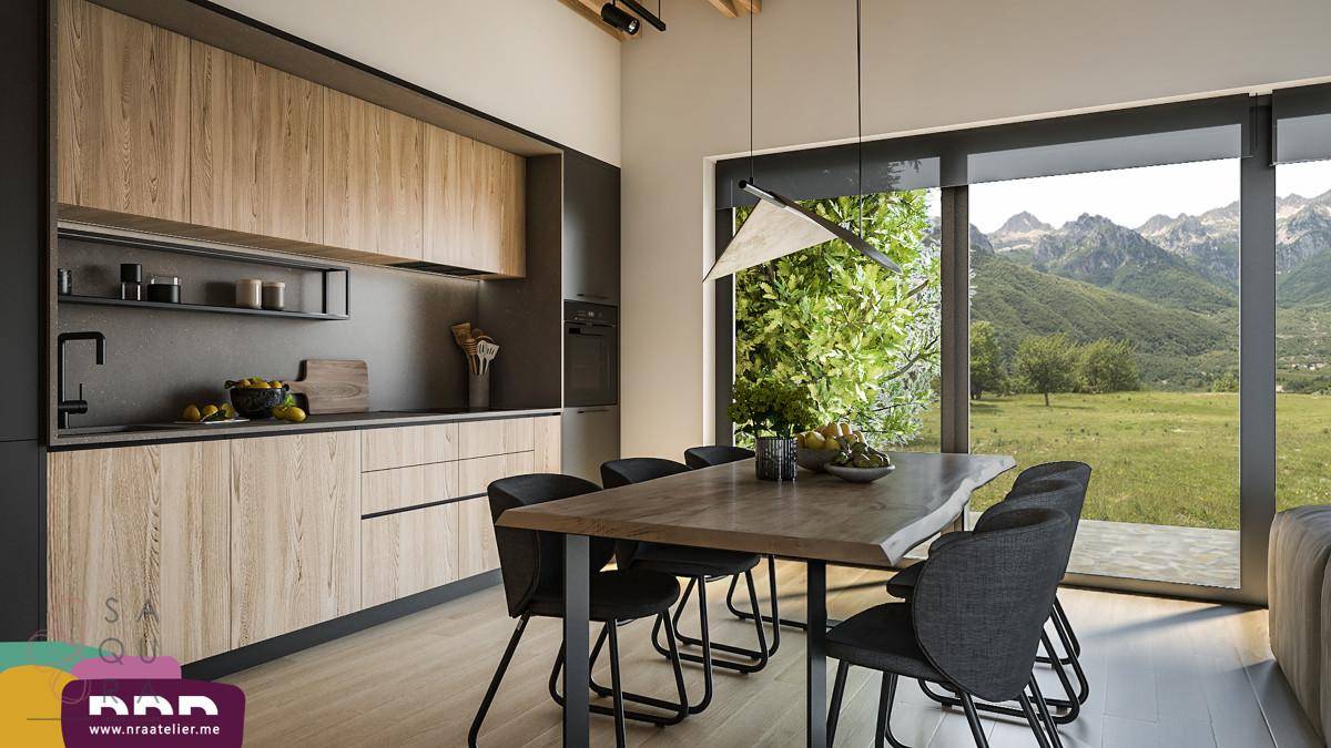 Stilvolle Küche mit Holzelementen, Essbereich und großen Fenstern mit Panoramablick auf die Berge.