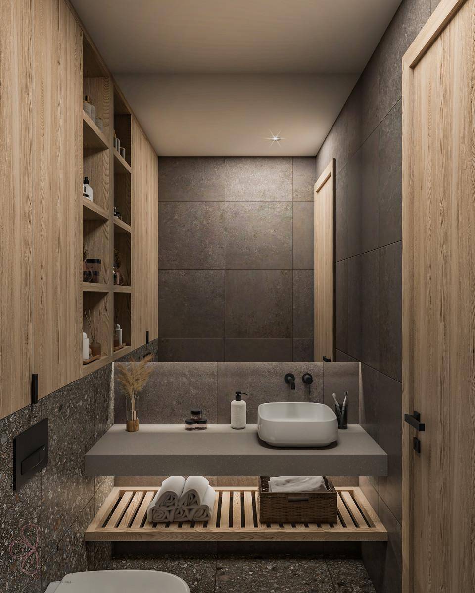 Modernes Badezimmer mit schwebendem Waschtisch, Spiegelschrank und dunklen Fliesen.