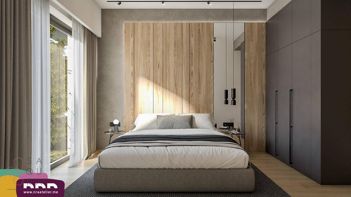 Modernes Schlafzimmer mit Holzwand, großem Bett und viel Tageslicht durch bodentiefe Fenster.