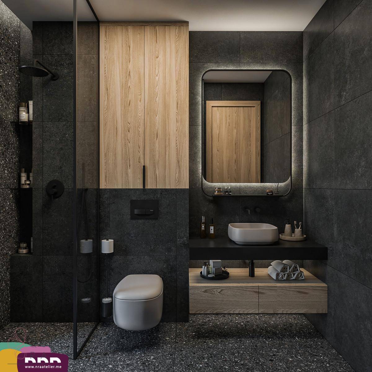 Luxuriöses Badezimmer mit dunklen Fliesen, beleuchtetem Spiegel und begehbarer Dusche.