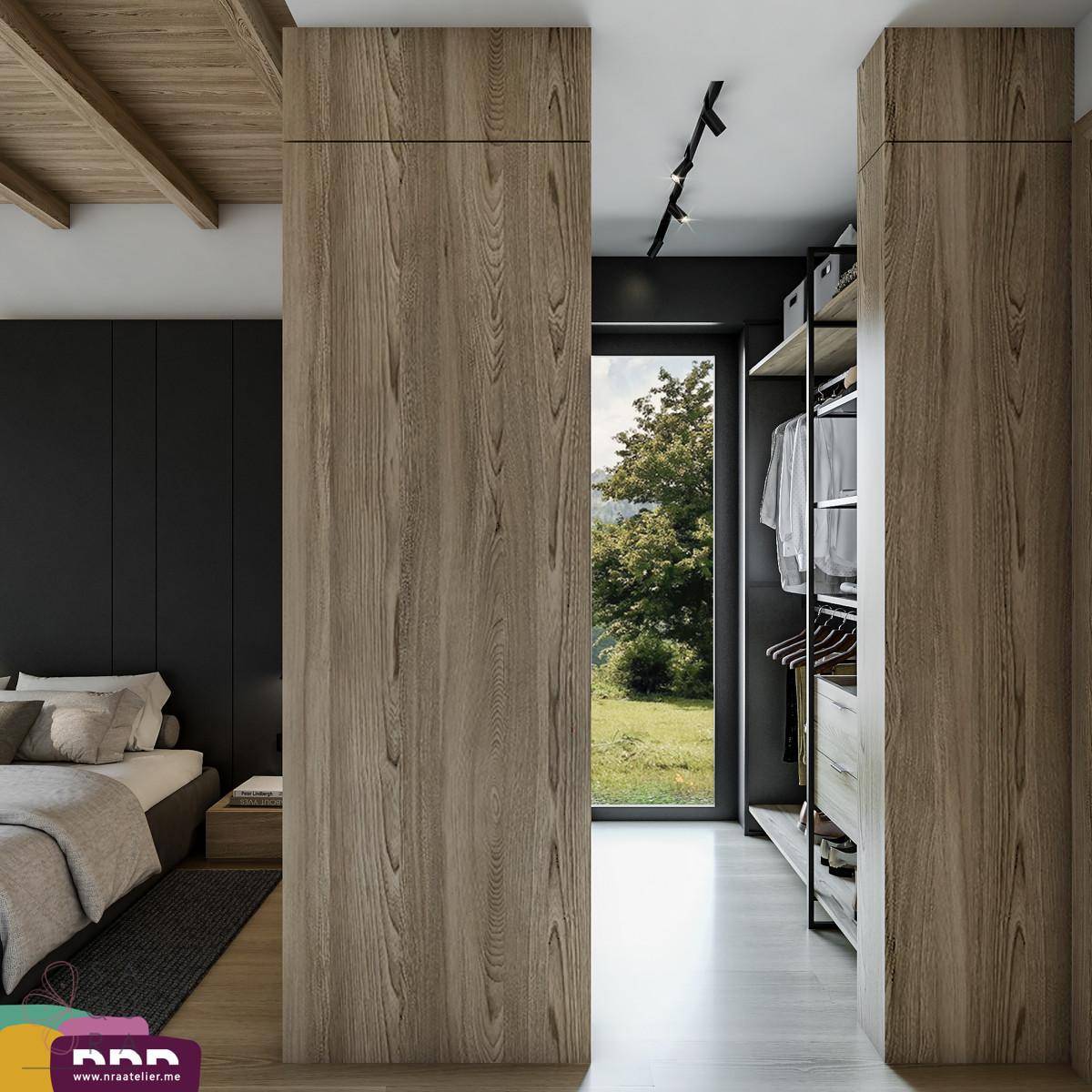 Schlafzimmer mit integriertem begehbarem Kleiderschrank und Blick ins Grüne.