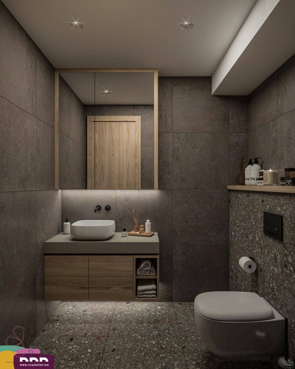 Modernes Badezimmer mit dunklen Fliesen, Holzwaschtisch und integriertem WC.