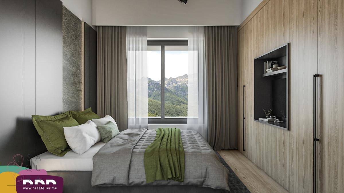 Helles Schlafzimmer mit Holzwand, Einbauschränken und Fenster mit Bergblick.