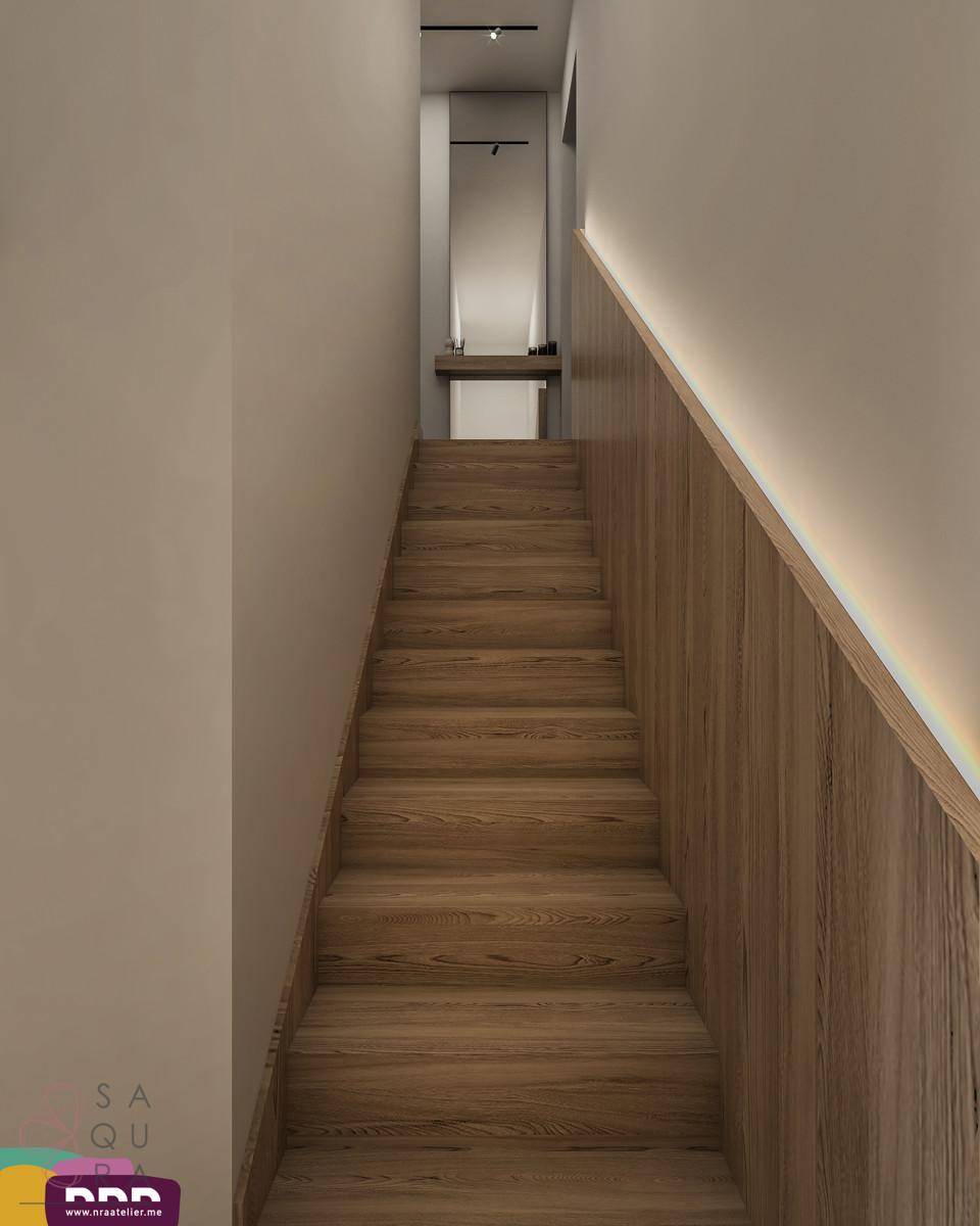 Holztreppe mit indirekter Beleuchtung und modernem Design, die verschiedene Ebenen verbindet.