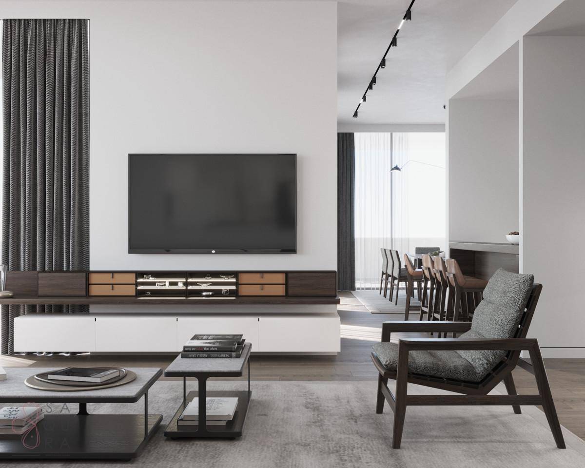 Geräumiges Wohnzimmer mit TV-Wand, Blick auf den Essbereich und moderne Einrichtung.