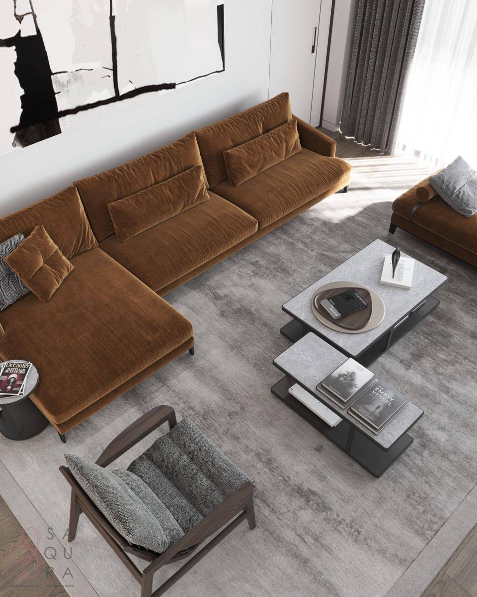 Draufsicht auf ein modernes Wohnzimmer mit brauner Eckcouch und zwei Couchtischen auf einem Teppich.
