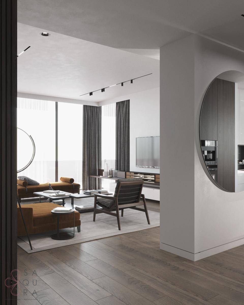 Stilvolles Wohnzimmer mit modernen Möbeln und einem runden Durchgang zu einem weiteren Raum.