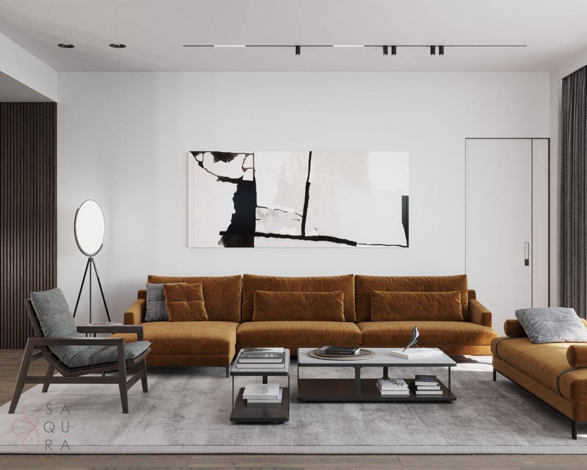 Modernes Wohnzimmer mit bequemer Couch, stilvollem Teppich und minimalistischer Kunst.