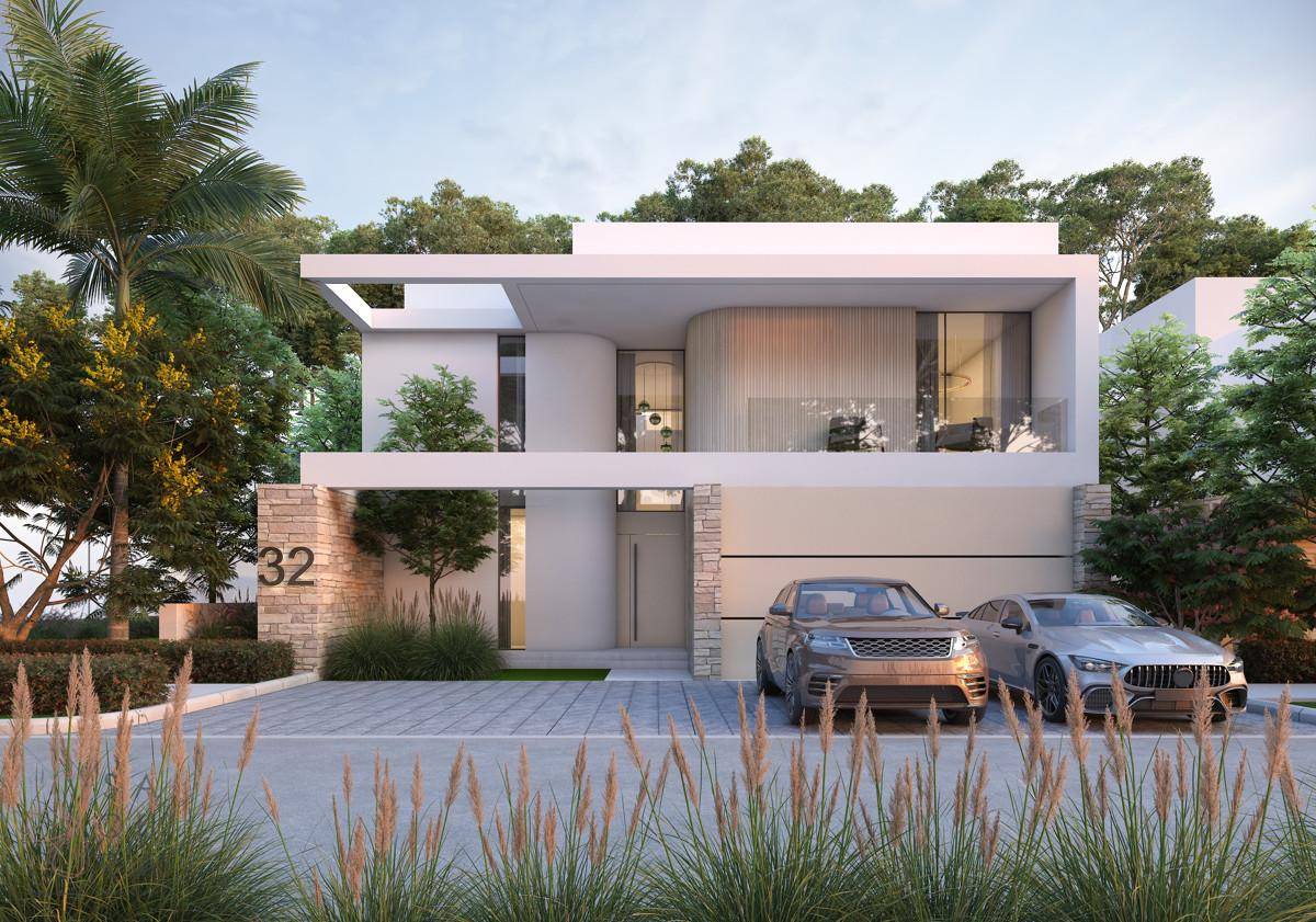 Elegante moderne Villa mit Steinfassade, Doppelgarage und gepflegter Auffahrt, umgeben von Grün.