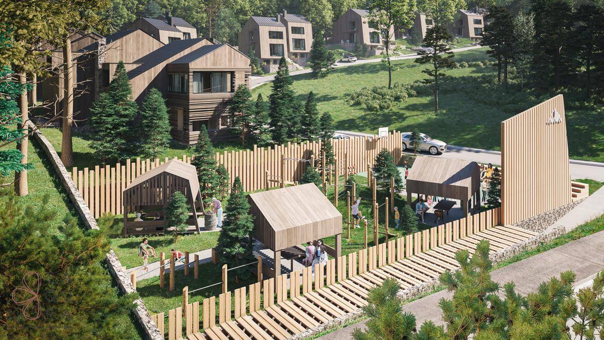 Kinderspielplatz mit Holzstrukturen und Zäunen, umgeben von Bäumen und modernen Häusern.