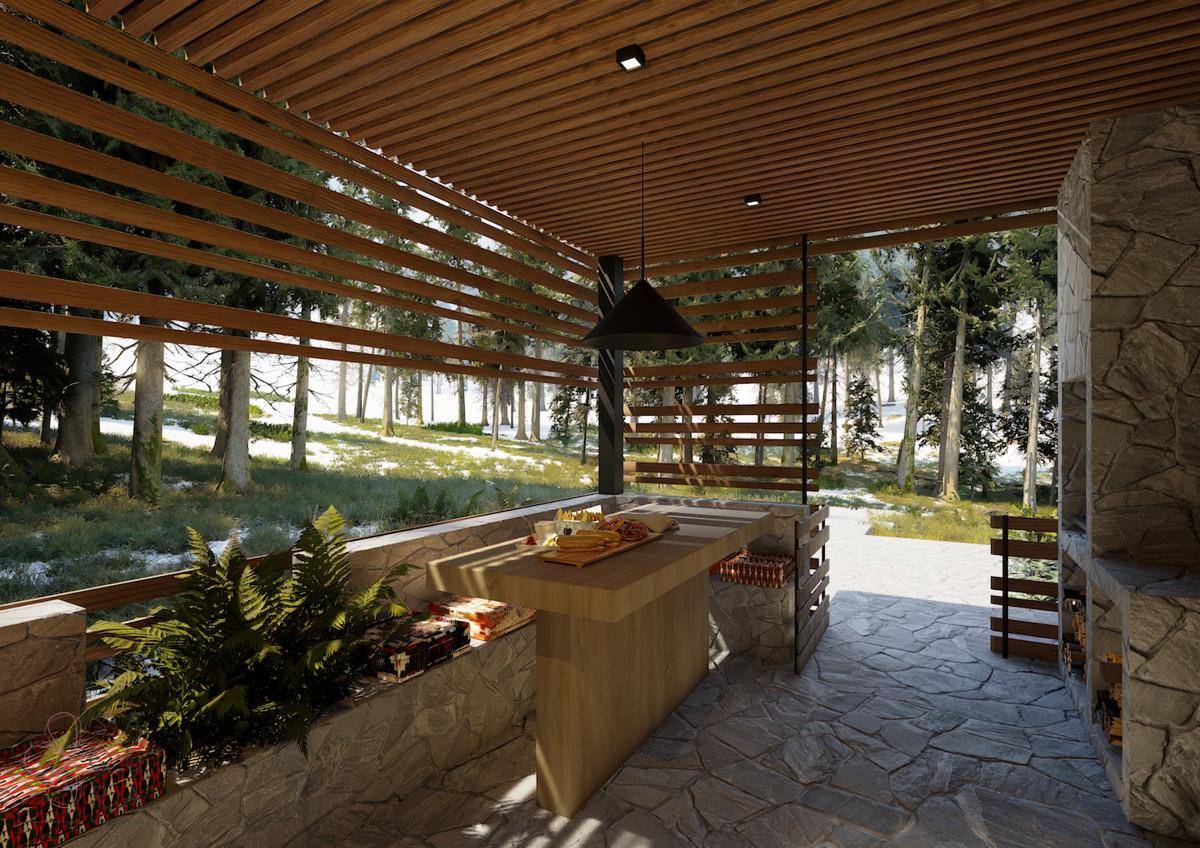 Überdachte Terrasse mit integrierter Außenküche und Grill, ideal für gesellige Stunden im Freien.