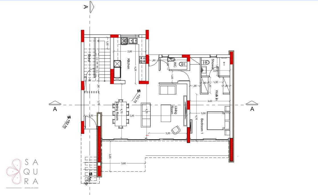 Grundriss des Erdgeschosses mit offenem Wohnbereich, Küche und einem Schlafzimmer.