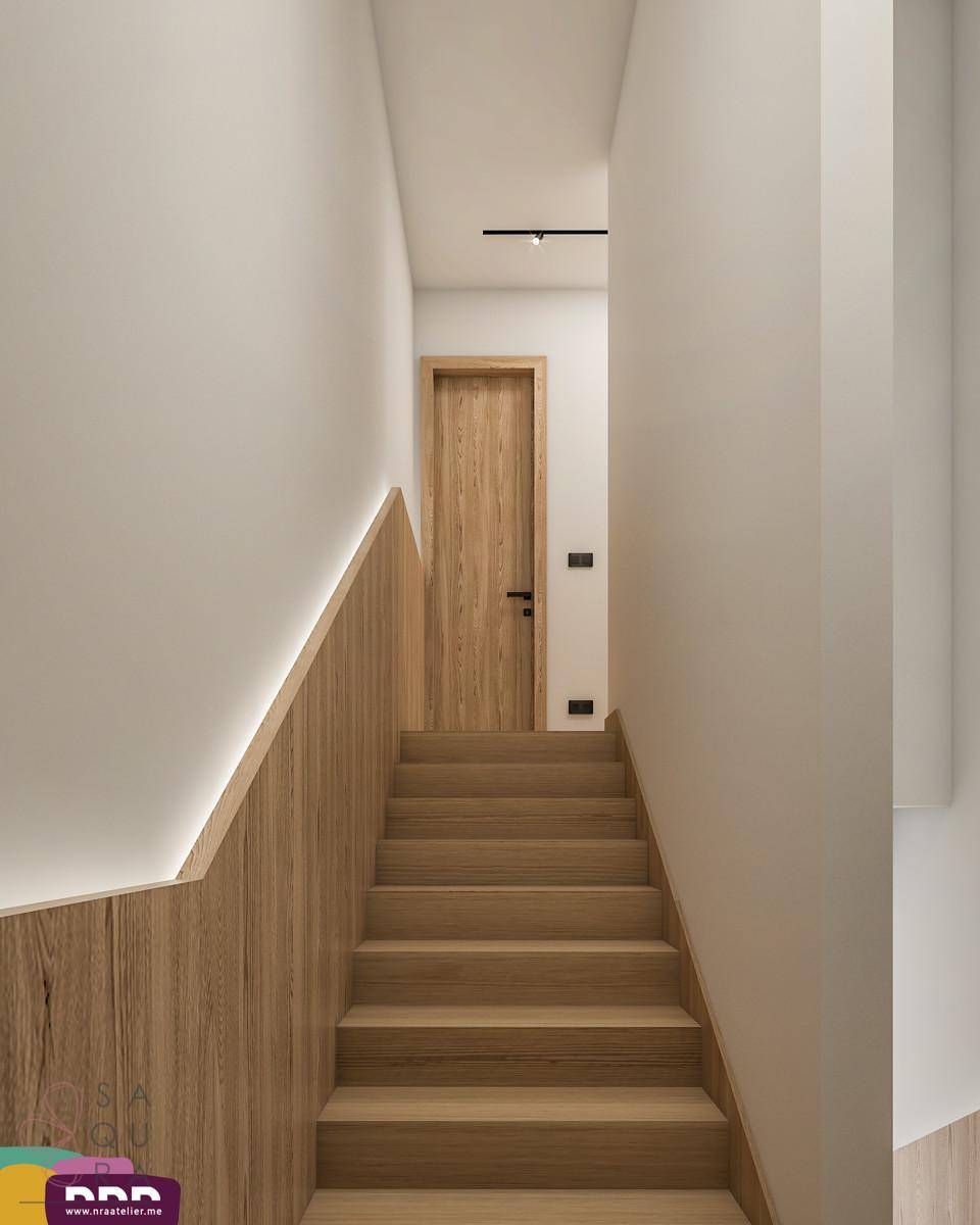 Moderne Holztreppe mit indirekter Beleuchtung, die zu einem oberen Stockwerk führt.