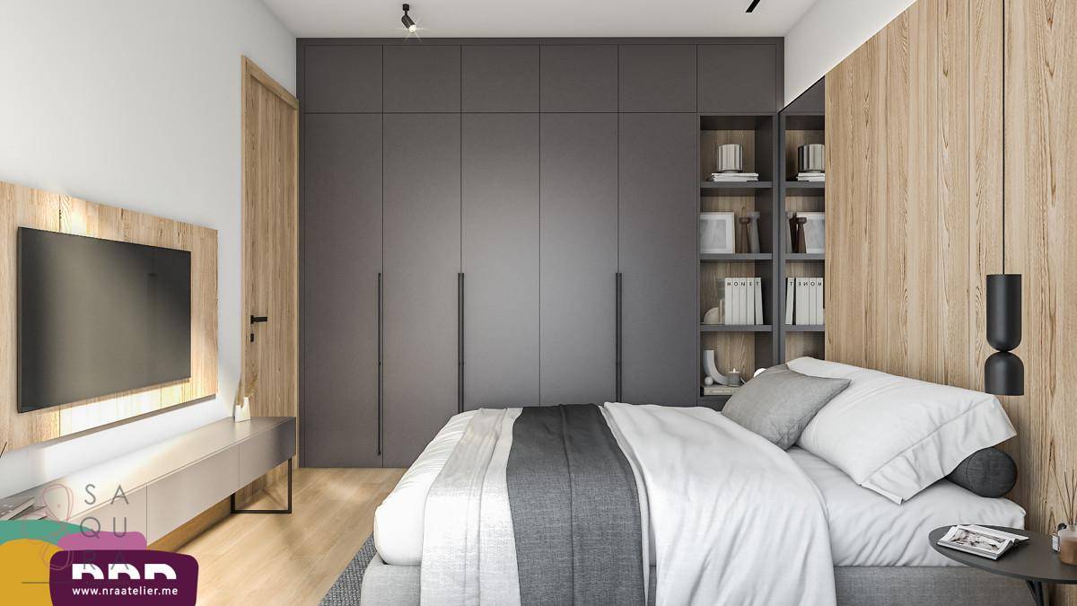 Modernes Schlafzimmer mit großem Einbauschrank, Holzakzenten und integriertem TV-Bereich.