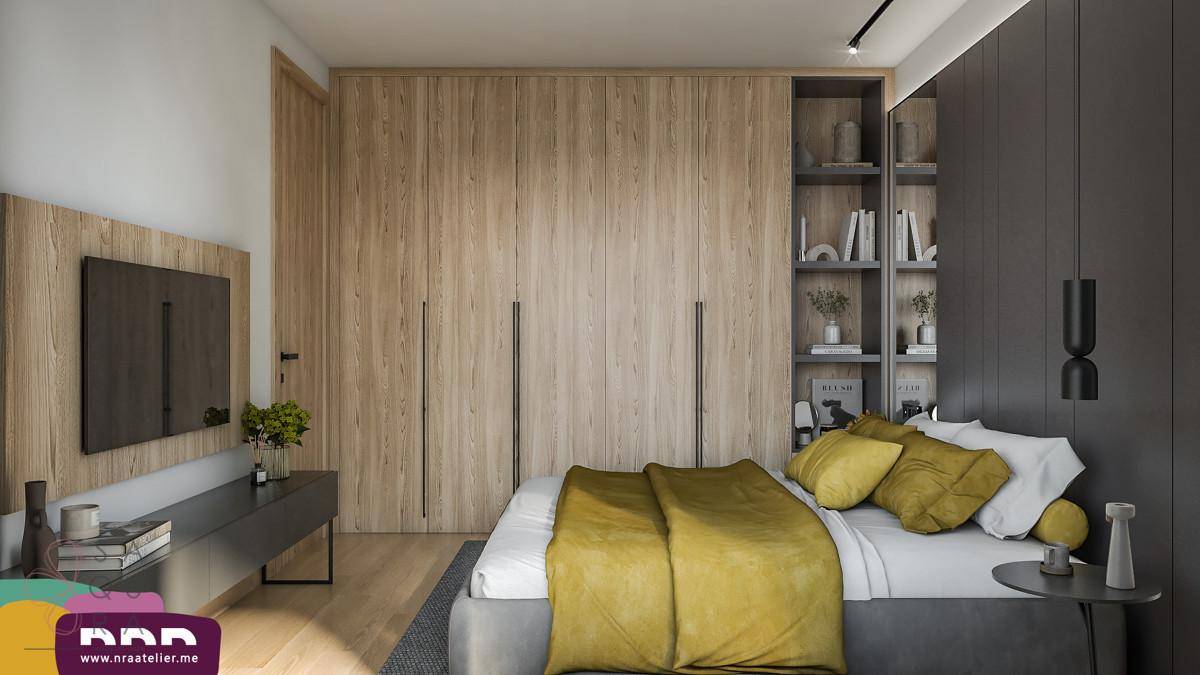 Geräumiges Schlafzimmer mit Holzeinbauschränken, modernem Bett und Blick auf die Berge.