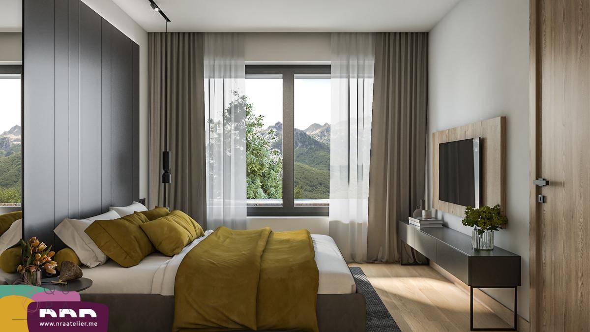 Schlafzimmer mit Bergblick durch ein großes Fenster, modernem Interieur und Holzboden.
