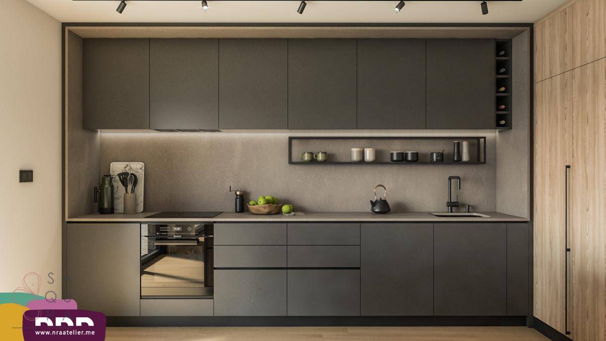 Detailansicht einer modernen Küche mit grauen Schränken, integriertem Backofen und Holzverkleidung.