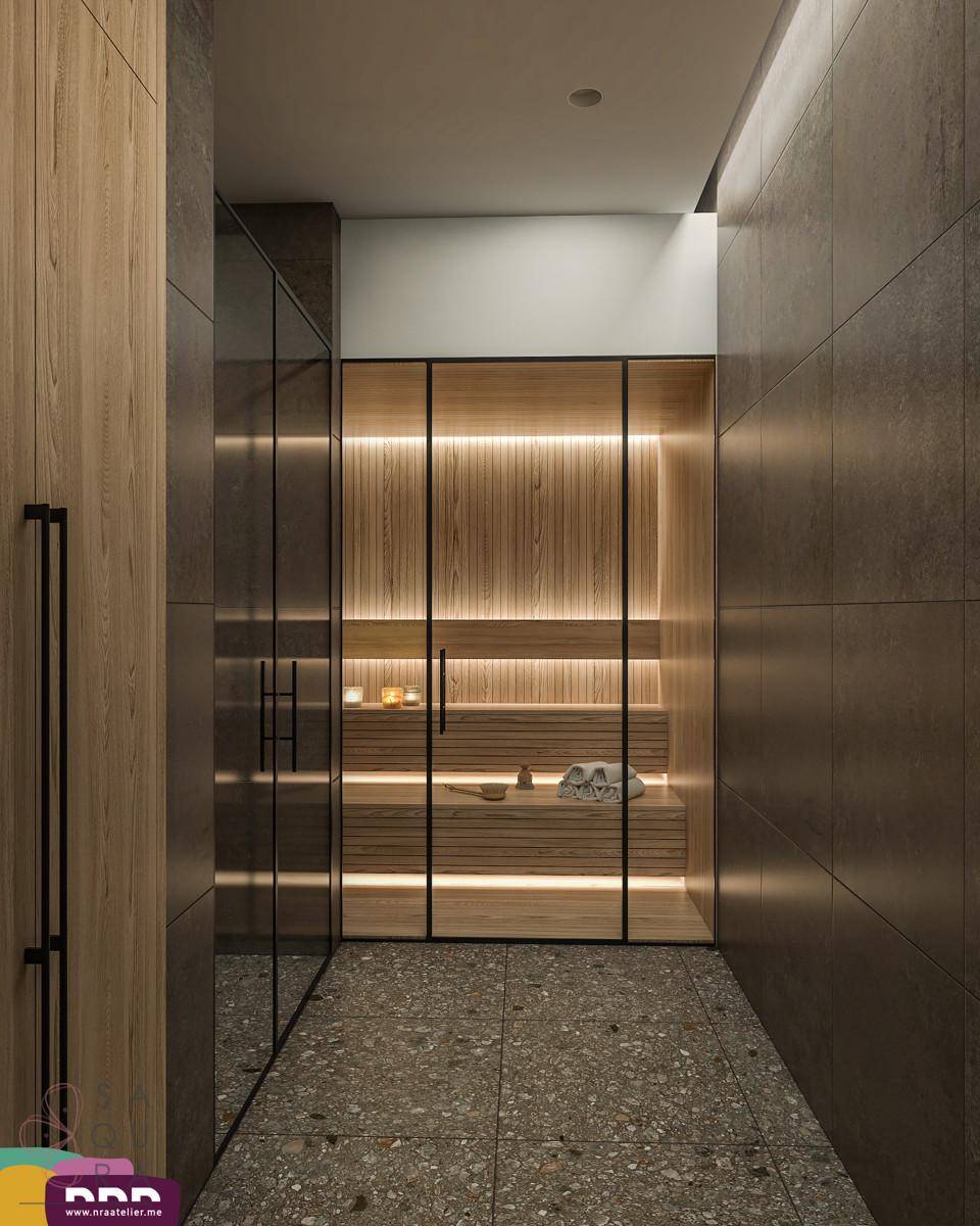 Moderner Wellnessbereich mit Sauna, Holzelementen und indirekter Beleuchtung.