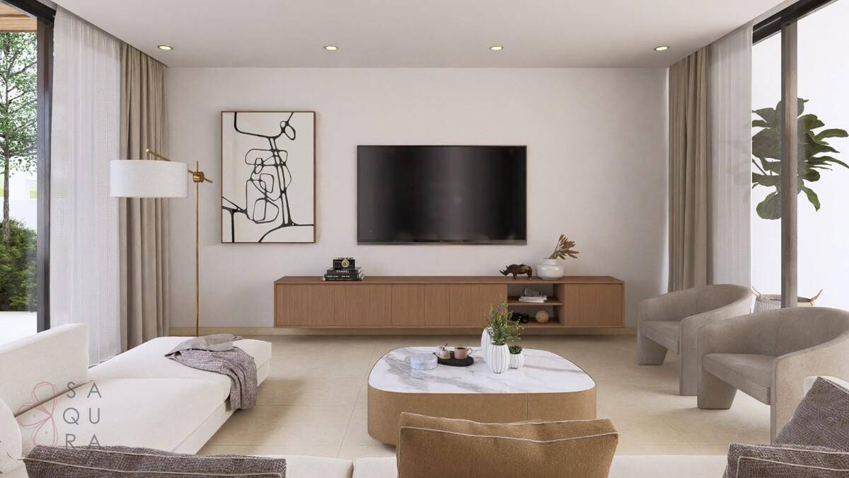 Helles modernes Wohnzimmer mit großem Sofa, Fernseher und stilvoller Dekoration.