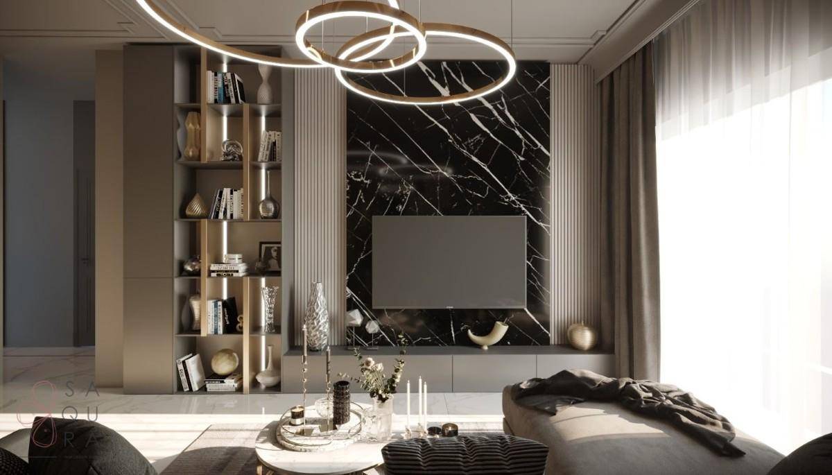 Elegantes Wohnzimmer mit schwarzer Marmorwand, integriertem TV und stilvollen Regalen, beleuchtet durch moderne Hängelampen.