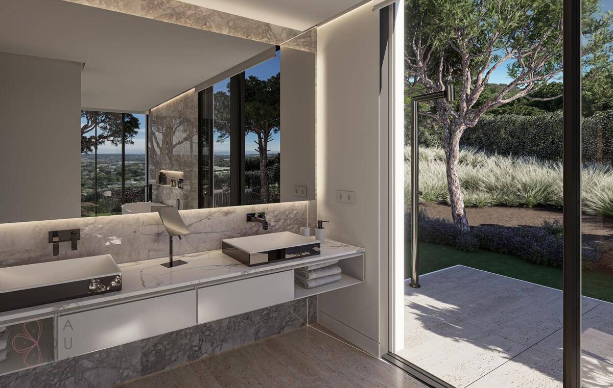 Modernes Badezimmer mit Doppelwaschbecken, Marmoroberflächen und Zugang zum Garten.