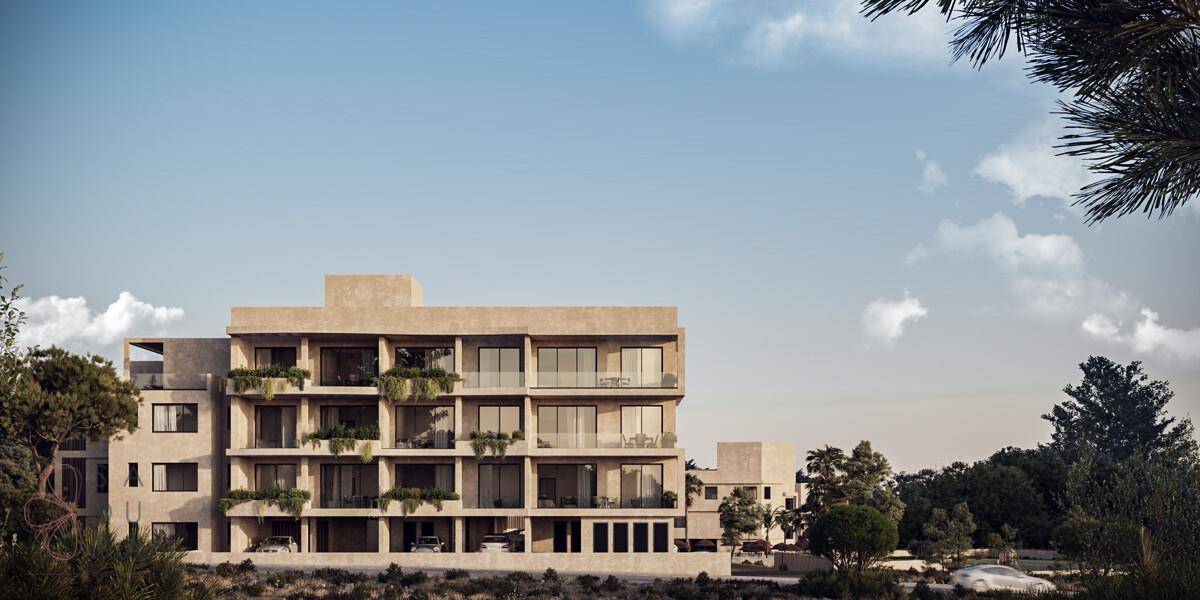 Moderner Apartmentkomplex mit mehreren Etagen, großen Glasfronten und begrünten Balkonen.