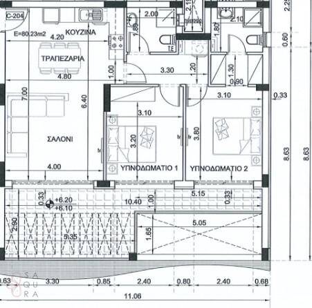 Grundriss einer Wohnung mit zwei Schlafzimmern, offenem Wohnbereich und Balkon.