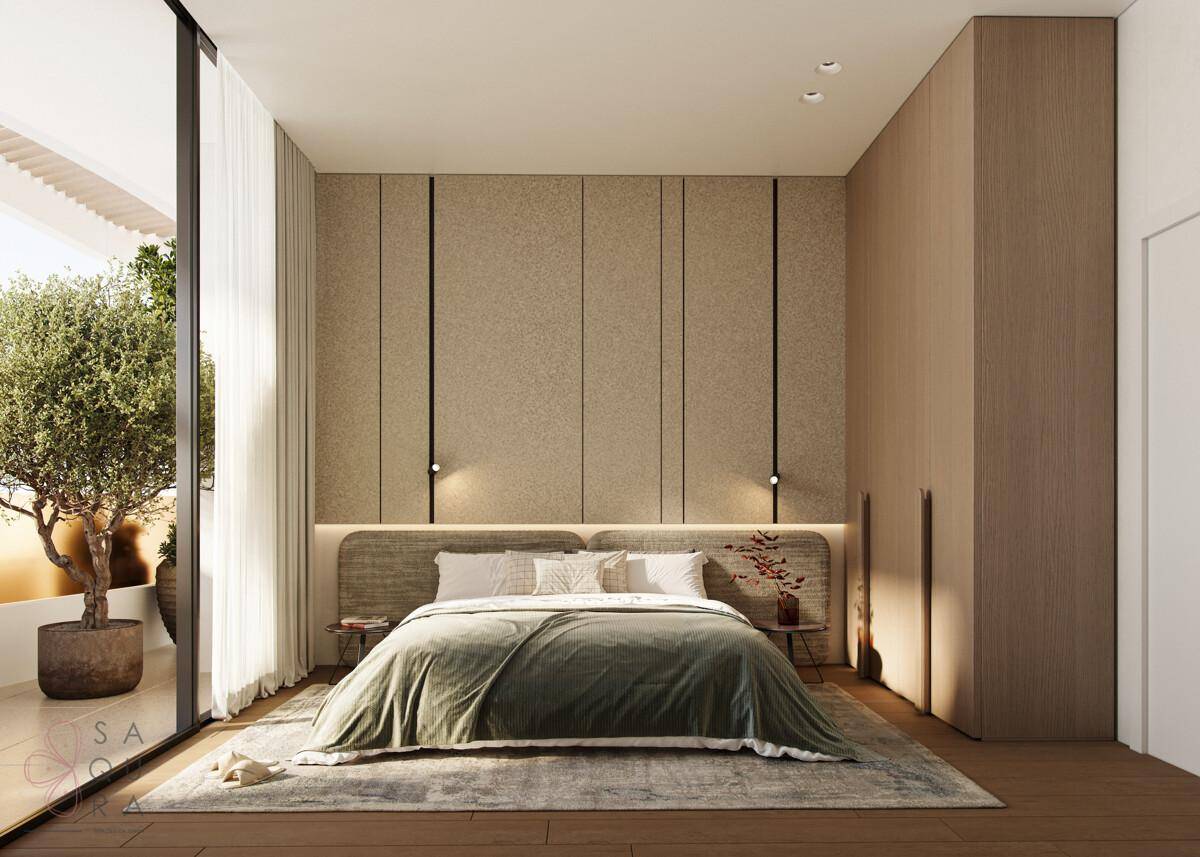 Modernes Schlafzimmer mit Holzakzenten, großem Bett und direktem Zugang zu einem Balkon.